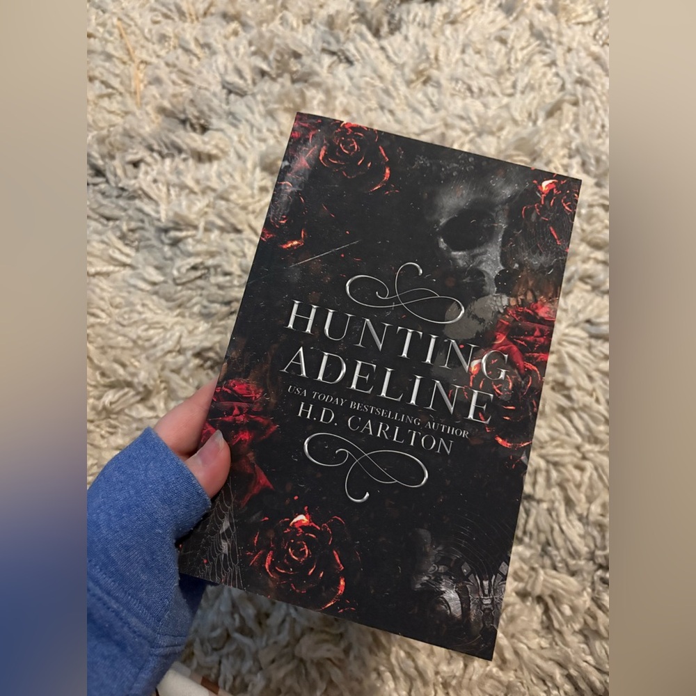 'Hunting Adeline' Book with Red and Black Cover